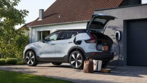Affordable electric SUV charging at a family home